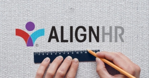 AlignHR Logo being measured on wall